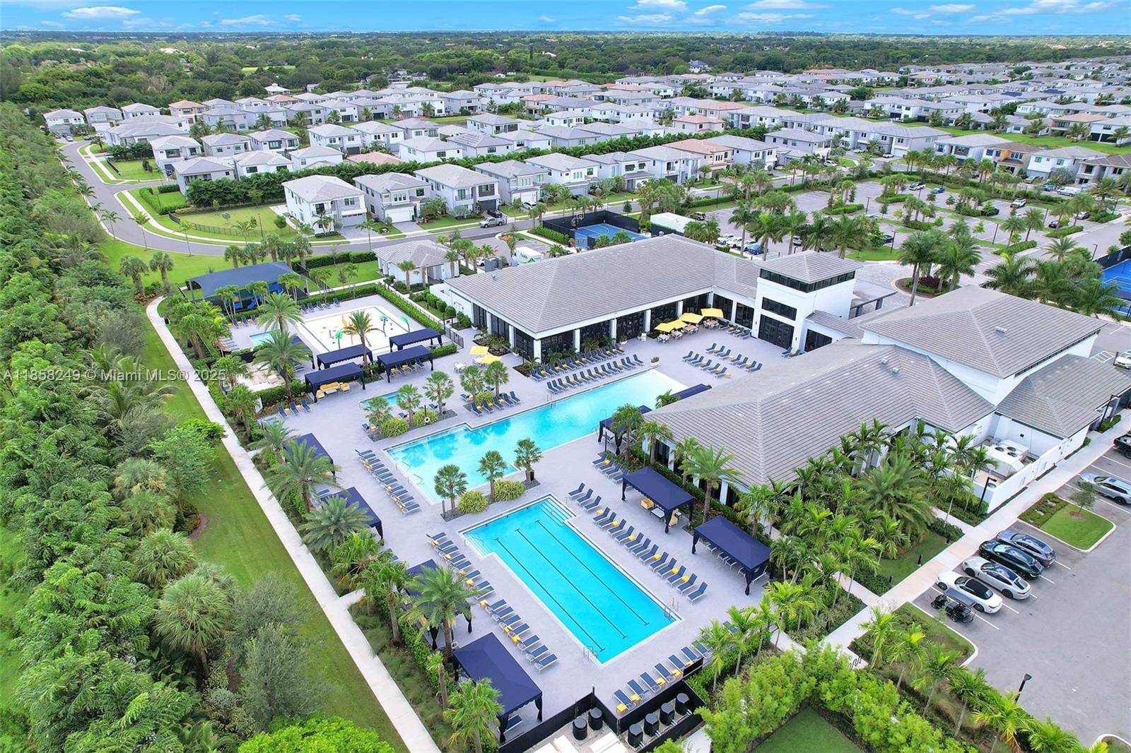 Located in Lotus, one of Boca Raton's most prestigious gated communities, this stunning 5 bedroom, 5 bathroom e perfectly blends modern style with timeless luxury.