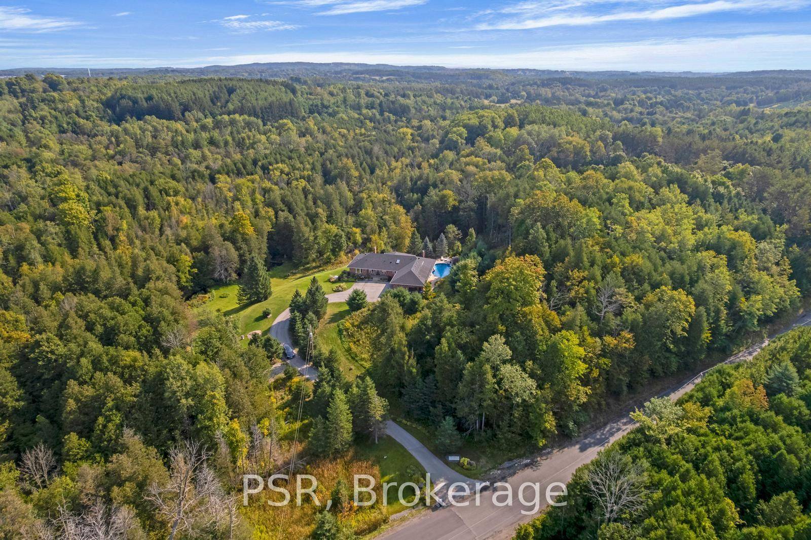 Welcome to 17397 Humber Station Road, A Private Retreat Surrounded by Nature Experience the rare opportunity to own a fully updated bungalow set on a breathtaking 24 acre estate, where ...
