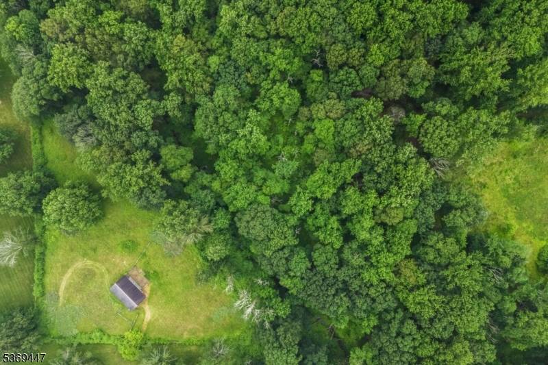 At the end of a private lane is the perfect location to build your dream home on this picturesque 5 acre Bernardsville Mountain lot.