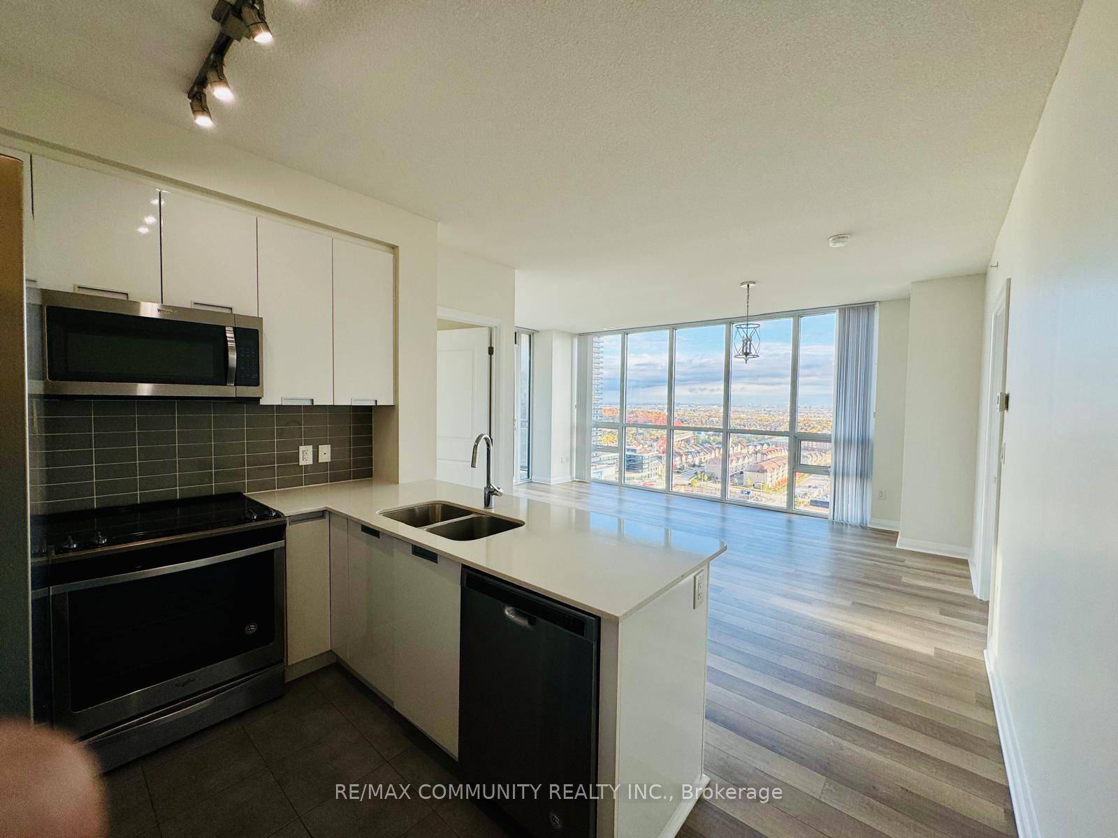 A freshly painted bright and spacious 2 bedroom Amber Condos by Pinnacle.