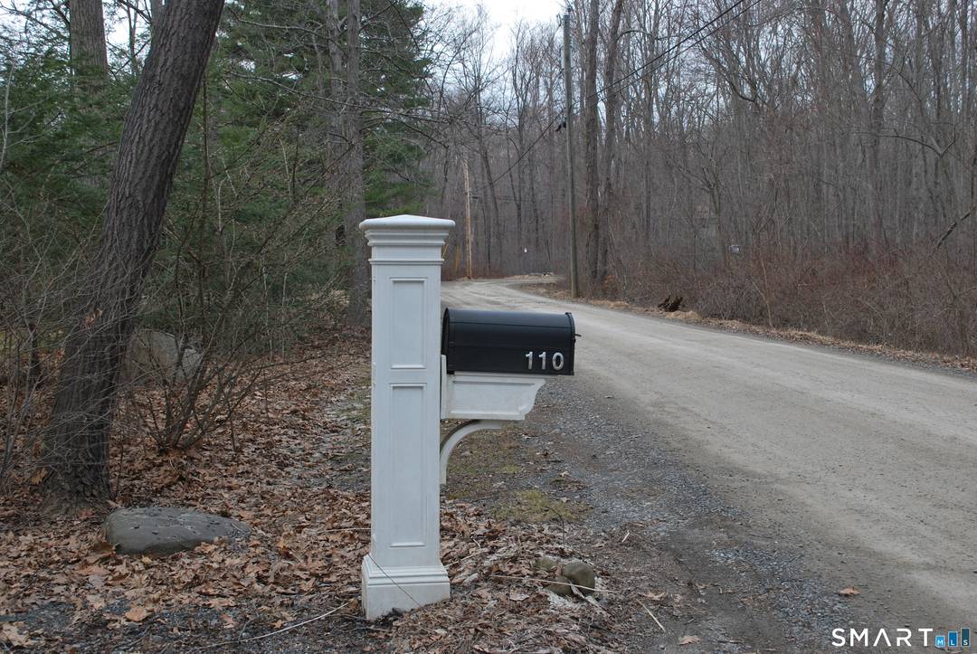 Experience the charm of this classic Cape Cod style property, featuring 3 bedrooms and 2 cozy fireplaces that invite warm gatherings on 1 acre of land perfect for outdoor enjoyment.