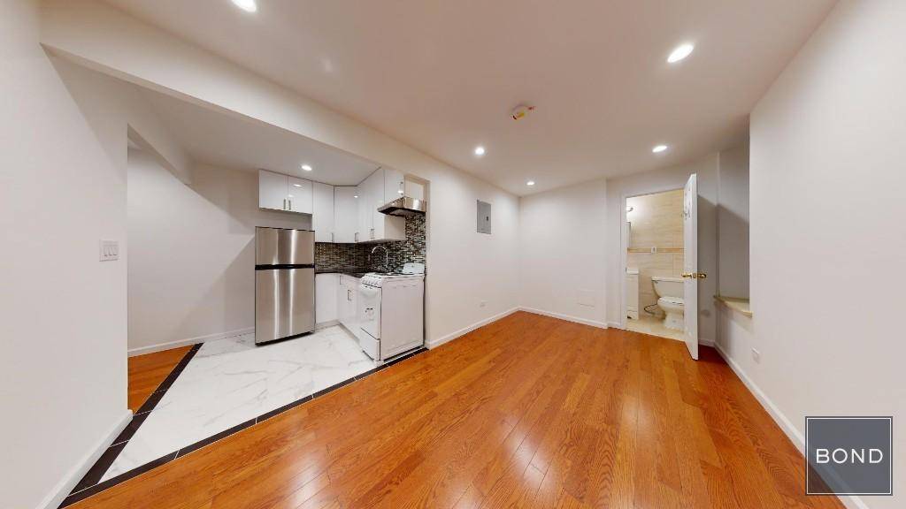 Renovated 2 bedroom apartment with oak floors and a marble bathroom on a very desirable East Village block.