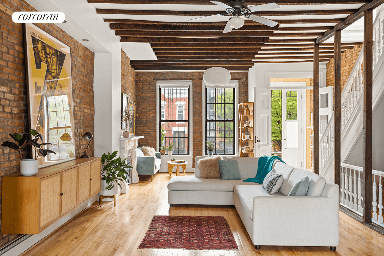 Come see this charming 2 Family townhouse with beautiful vintage details, exposed brick and many modern upgrades and a stunning garden !