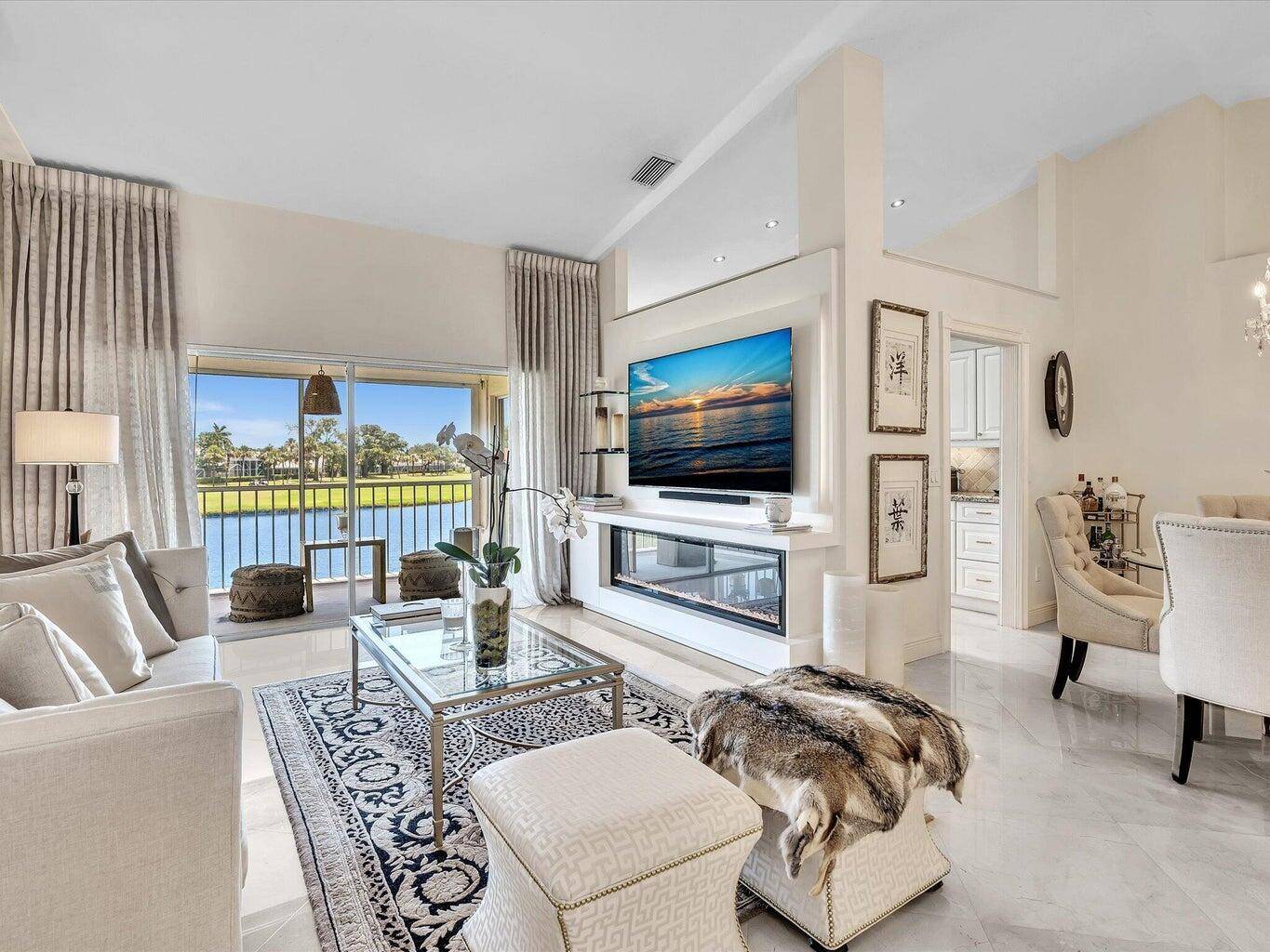Public Remarks Seasonal remodeled 3 2 Coach House with Spectacular Views of the Golf Course and Lake from virtually all of the home yet still completely private and tranquil.
