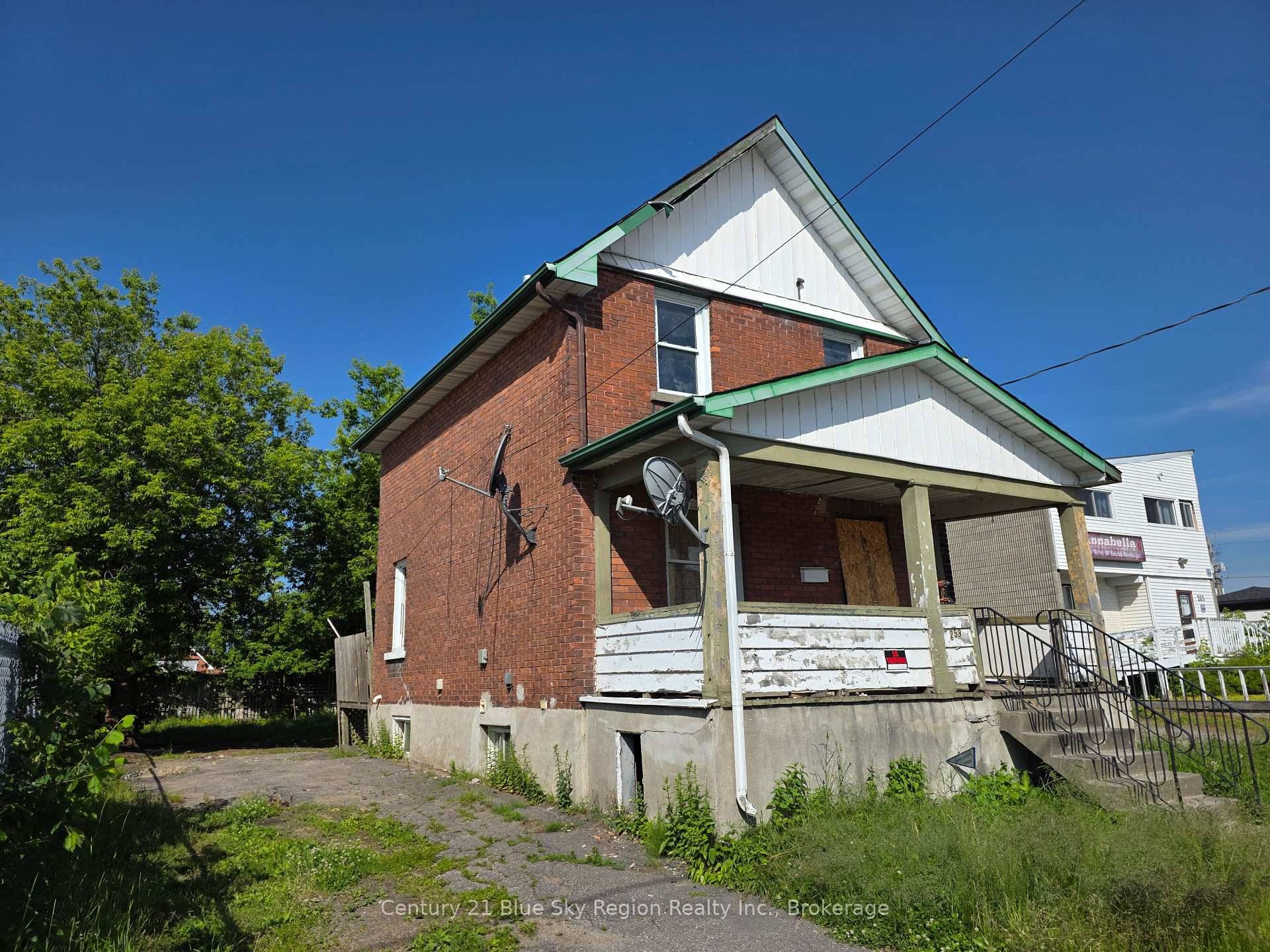 This property is zoned C2 commercial with permitted single family residential use, offering exceptional flexibility for a variety of future uses.