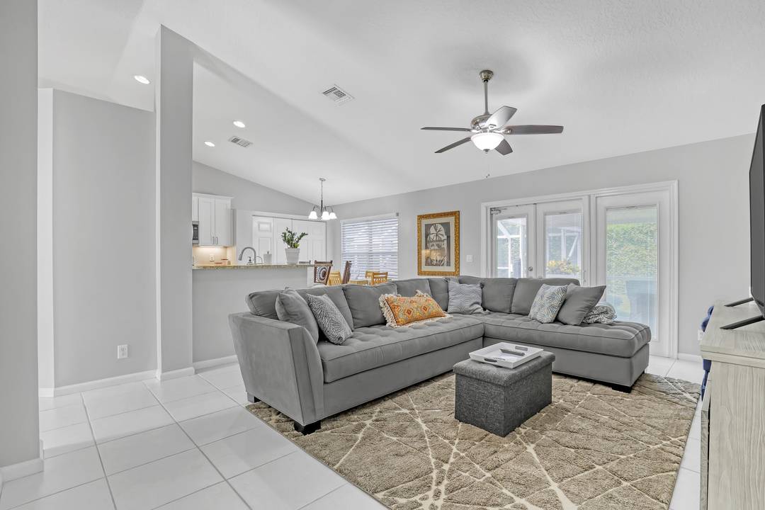 IMMACULATE 3 bedroom den, 2 bath, 2 car garage Pool home in Estates of Royal Palm Beach.