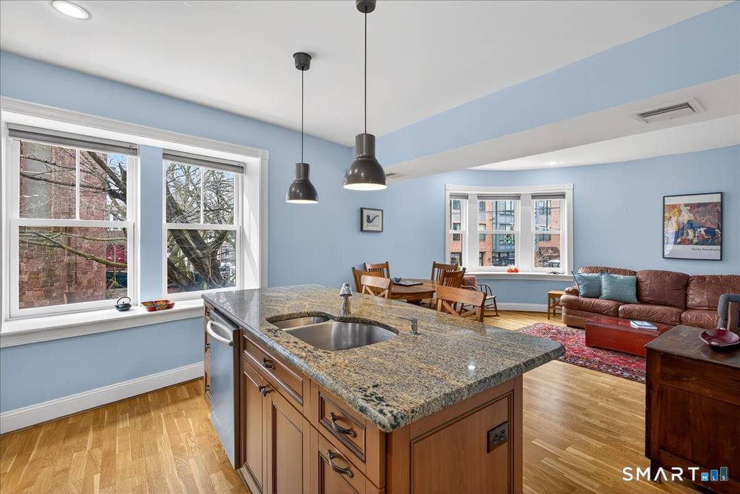 Modern, spacious, and distinctive in town condo with 2 bedrooms and 2 baths in Wooster Square.