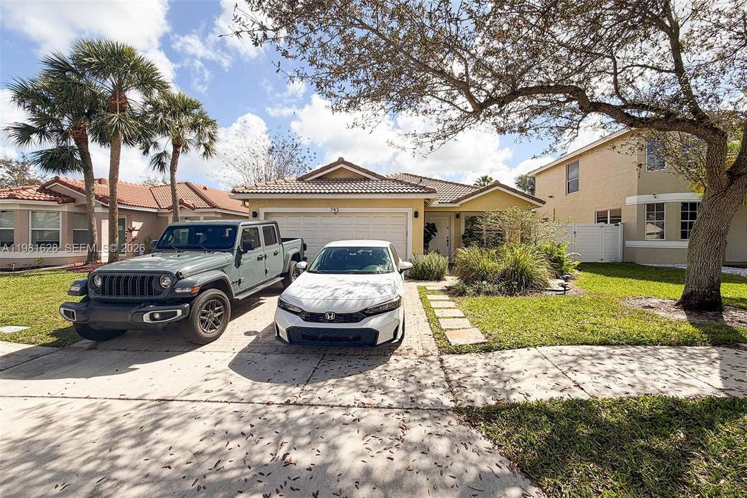 Beautifully maintained 3 Bed 2 Bath single family home located in the gated community of Egret Walk at Pembroke Pines, offering tranquil lake and preserve views.