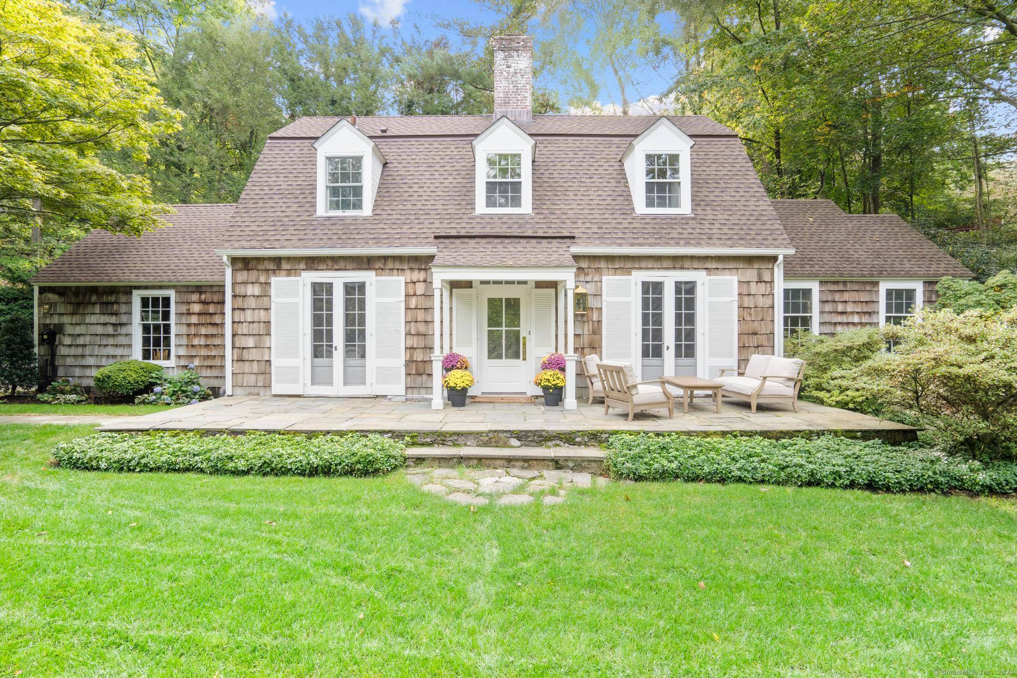 Prepare to be wowed by this one of a kind, custom renovated Cape in the highly sought after Mid Ridges neighborhood.