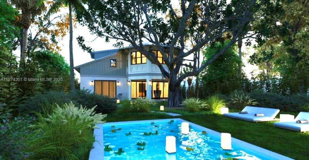 A rare treasure, this brand new home was thoughtfully designed by renowned architect Luigi Vitalini to blend timeless Coconut Grove character with modern comfort.