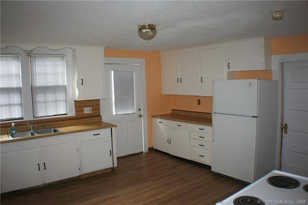 Well maintained three unit multifamily property situated in a quiet residential neighborhood just two minutes from the Enfield Malls.