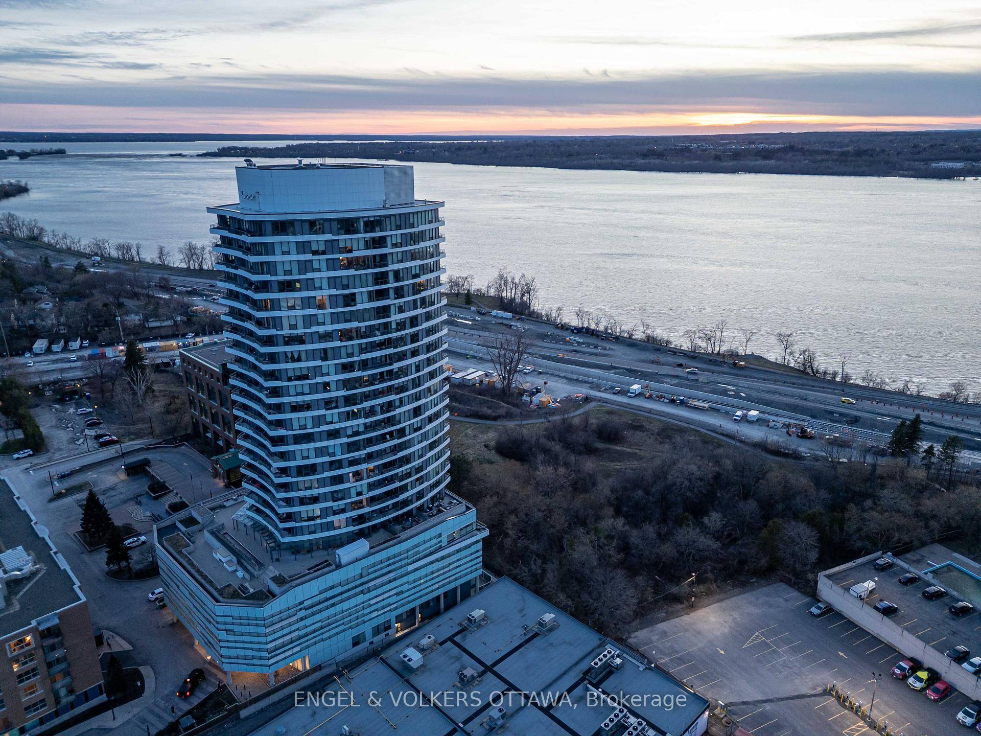 Welcome to Penthouse 2502 a sophisticated retreat with breathtaking views of the Ottawa River.