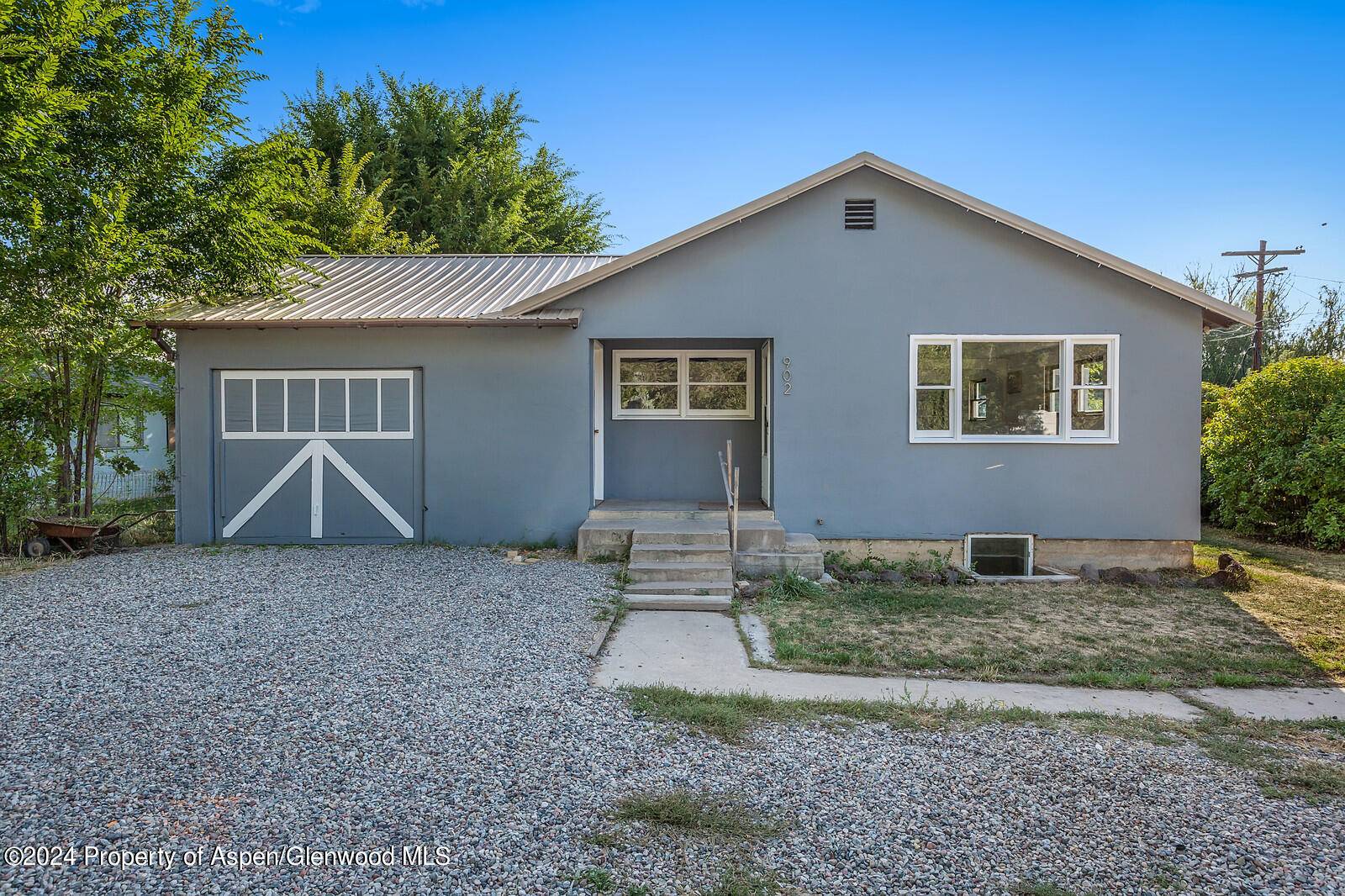Great home with 3 Bedrooms, large lot with ample parking, original charm, lots of storage !