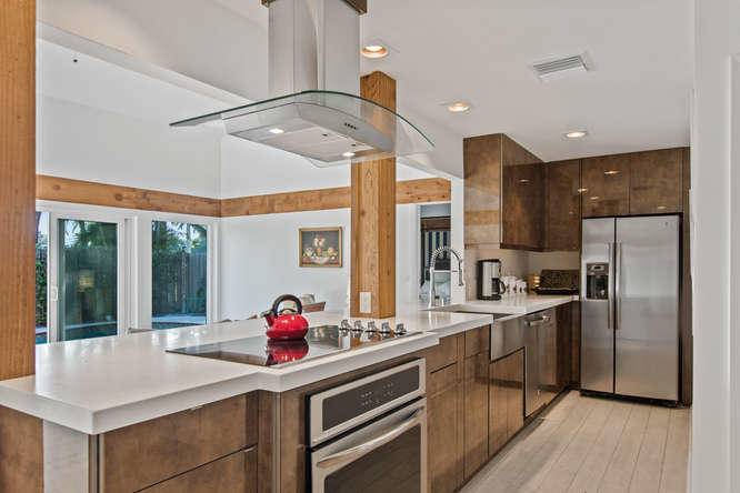 Stunning, completely remodeled and updated bungalow with 2 Master bedroom suites.