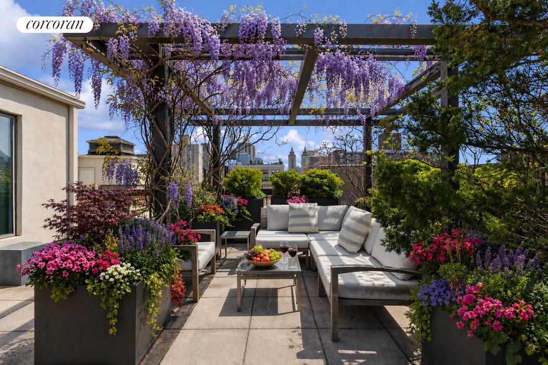 TERRACE LOVERS' DREAM ! With approximately 2, 000sqft of indoor and outdoor space, this penthouse oasis offers a rare blend of charm, comfort, and seamless indoor outdoor living.