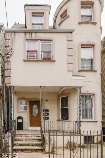 Prime Newark Investment Opportunity Welcome to 309 Summer Avenue, a well located three family property offering strong upside and long term value in the heart of Newark.
