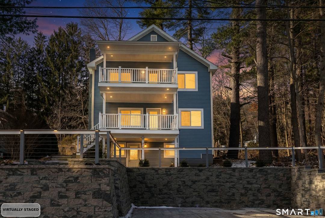 Lake Living at Its Finest Staffordville Reservoir Experience the perfect blend of luxury, lifestyle, and location in this stunning Colonial overlooking the Staffordville Reservoir, complete with lake beach rights approx.