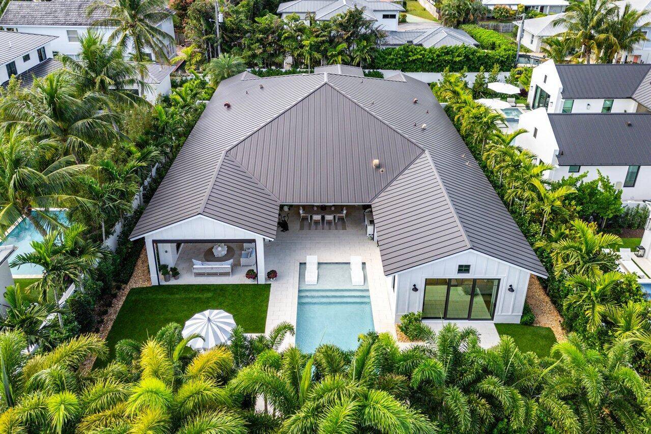Nestled in the prestigious Lake Ida neighborhood of Delray Beach, 10 NW 17th Street stands as a perfect example of how to enjoy maximalist luxury living without sacrificing privacy and ...
