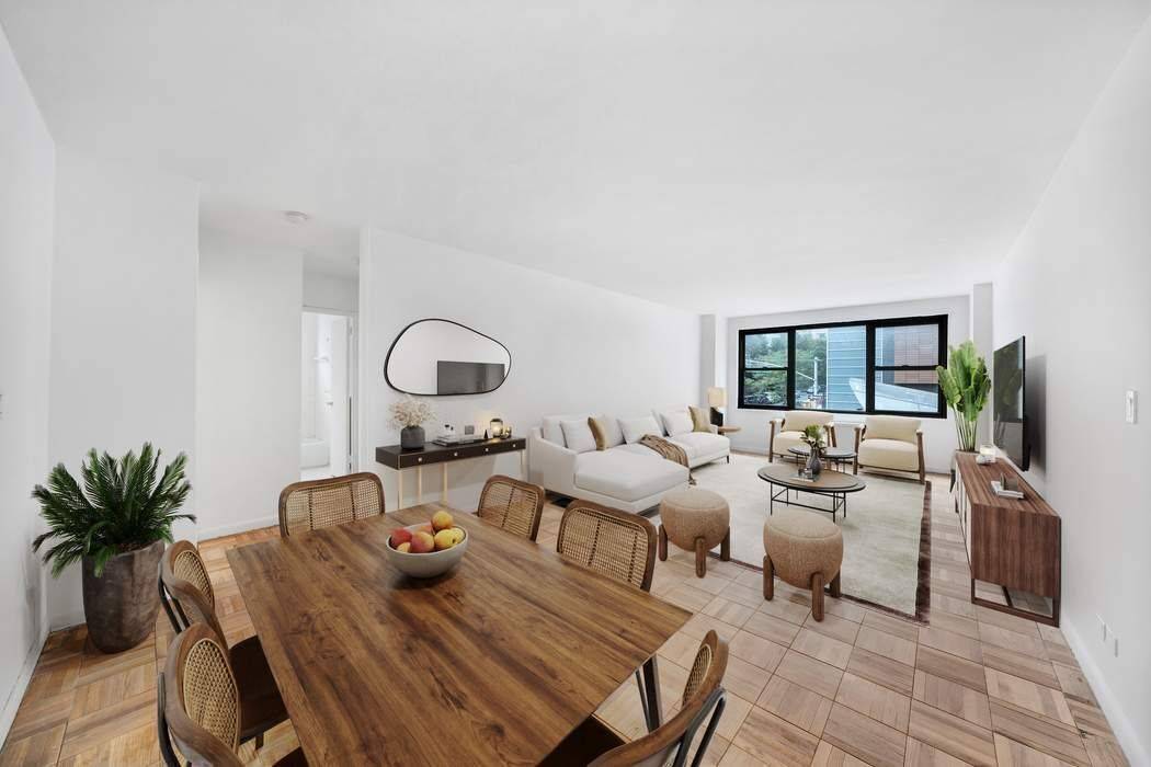 Residence 2G at The Mayfair is an expansive two bedroom, one bathroom home nestled on a peaceful, tree lined street in Lenox Hill.