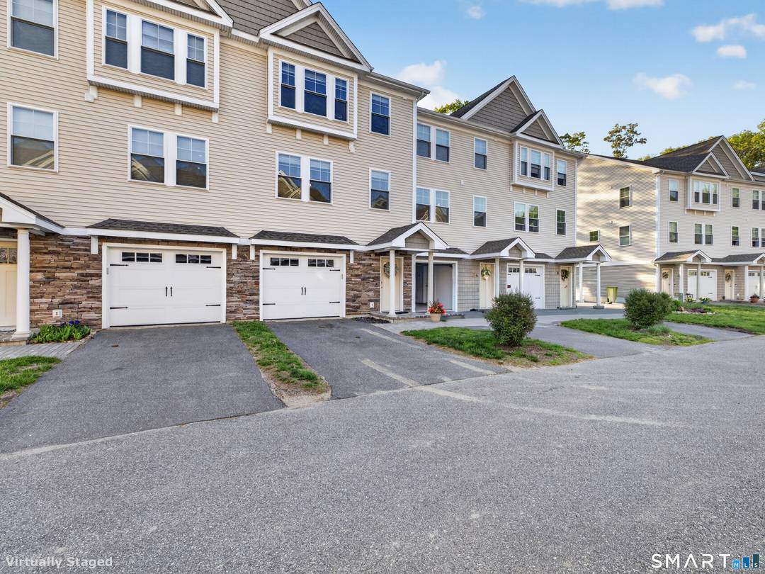 Sophisticated Turnkey Living on the CT Shoreline Welcome to Village Crossing, where modern sophistication meets effortless coastal living.