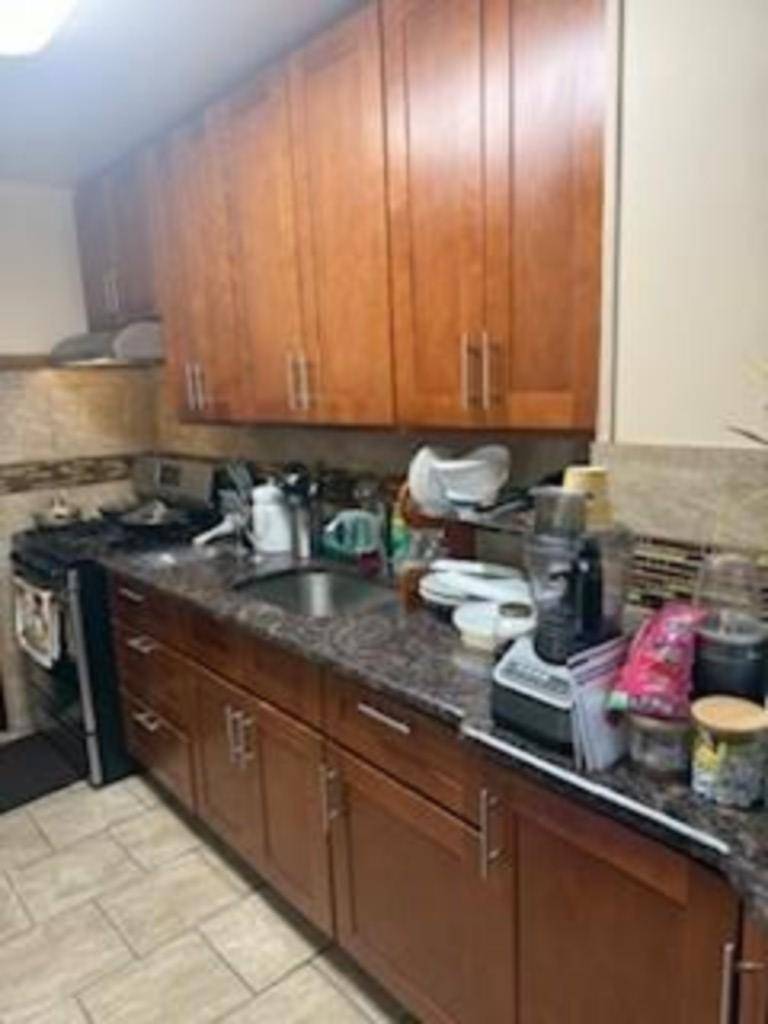 Two family home in Woodhaven, ideally located in close proximity to the J and Z subway lines.