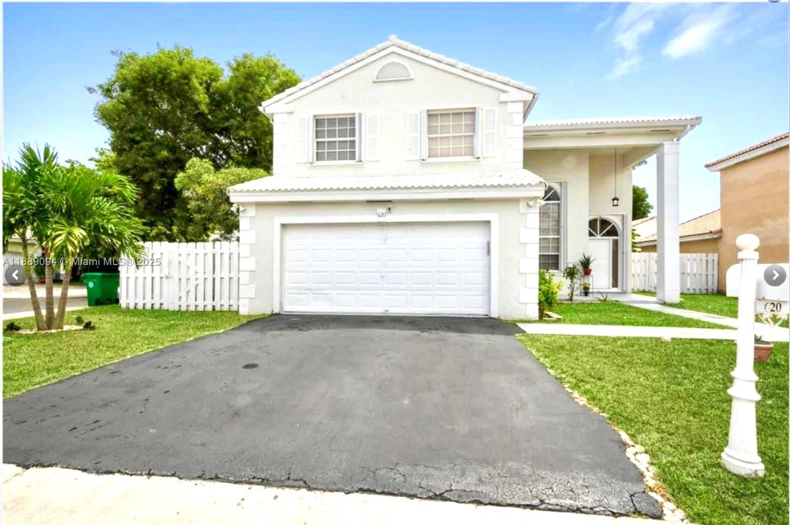 Unique single family house with 4 bedrooms and 2 1 2 bathrooms with pool and garage for two cars.