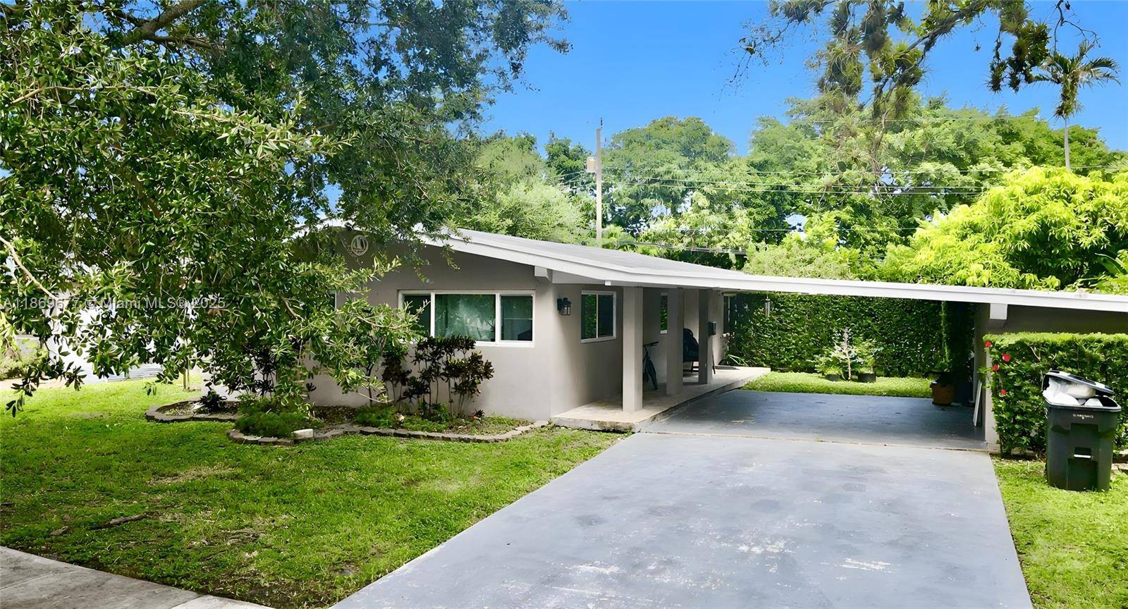 Discover this stunning 3 bedroom den, 2 bathroom home in the heart of Hollywood with no HOA fees.