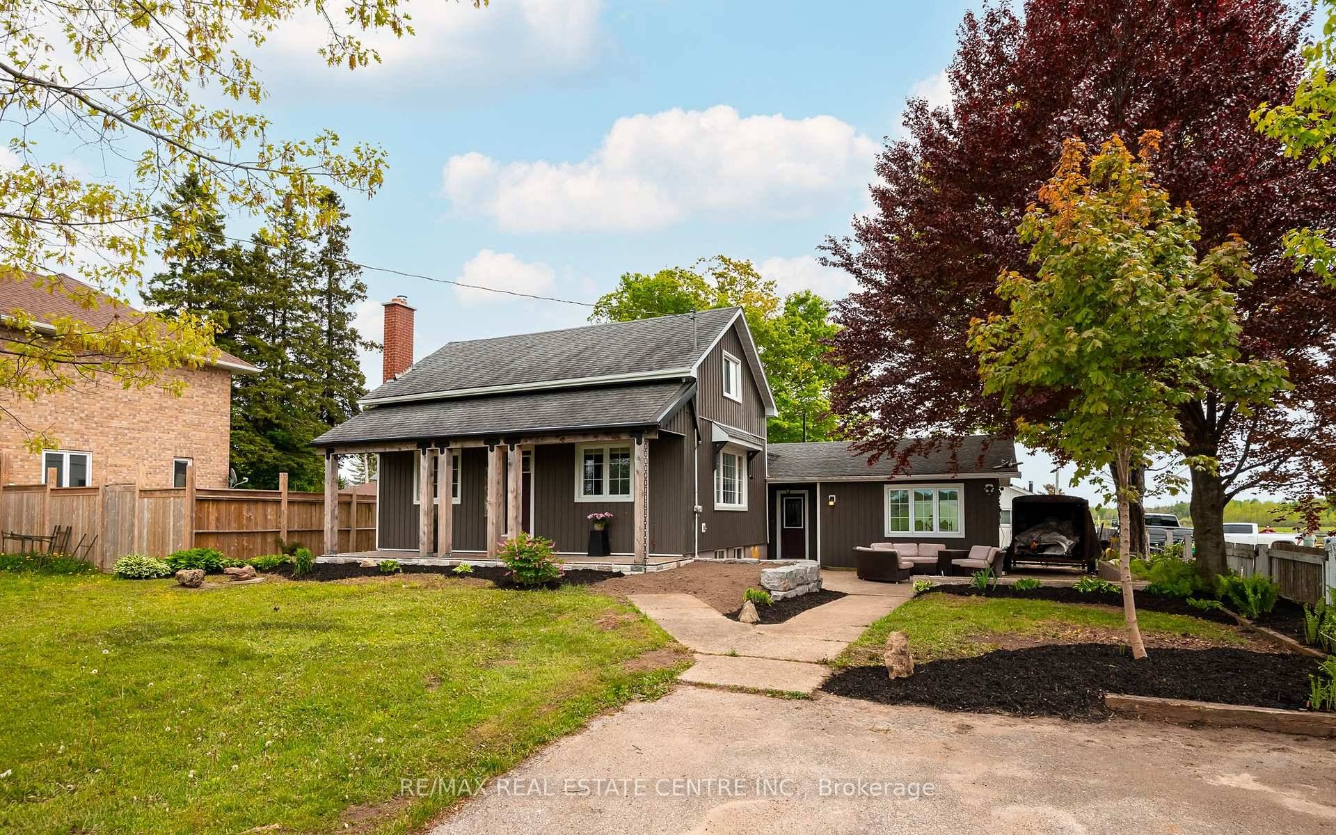 You'll fall in love with this home the moment you pull up, starting with the cute covered porch and beautiful patio.