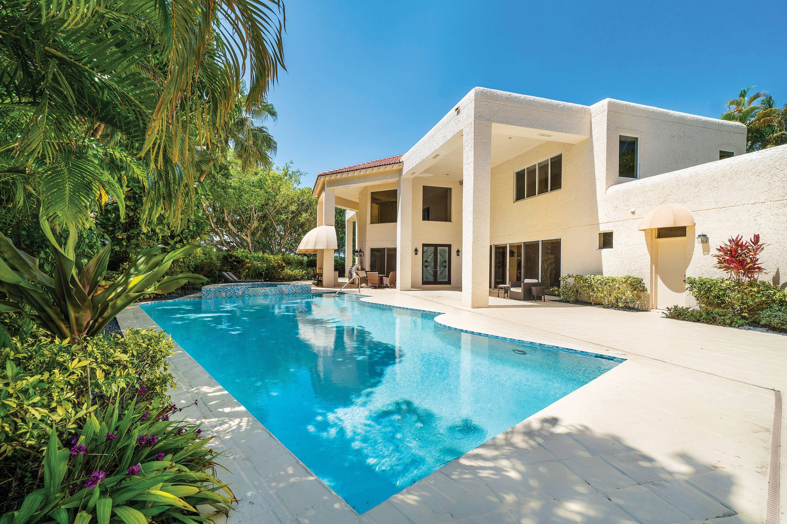 Upon entering through the courtyard double doors you will be surprised by the reveal of the enormous patio space.