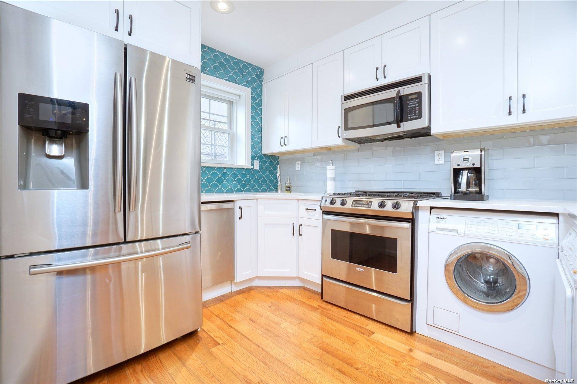 CORNER UNIT OF 2007 YOUNG BUILDING IN THE MOST DESIRABLE COMMERCIAL RESIDENTIAL AREA OF RIDGEWOOD.