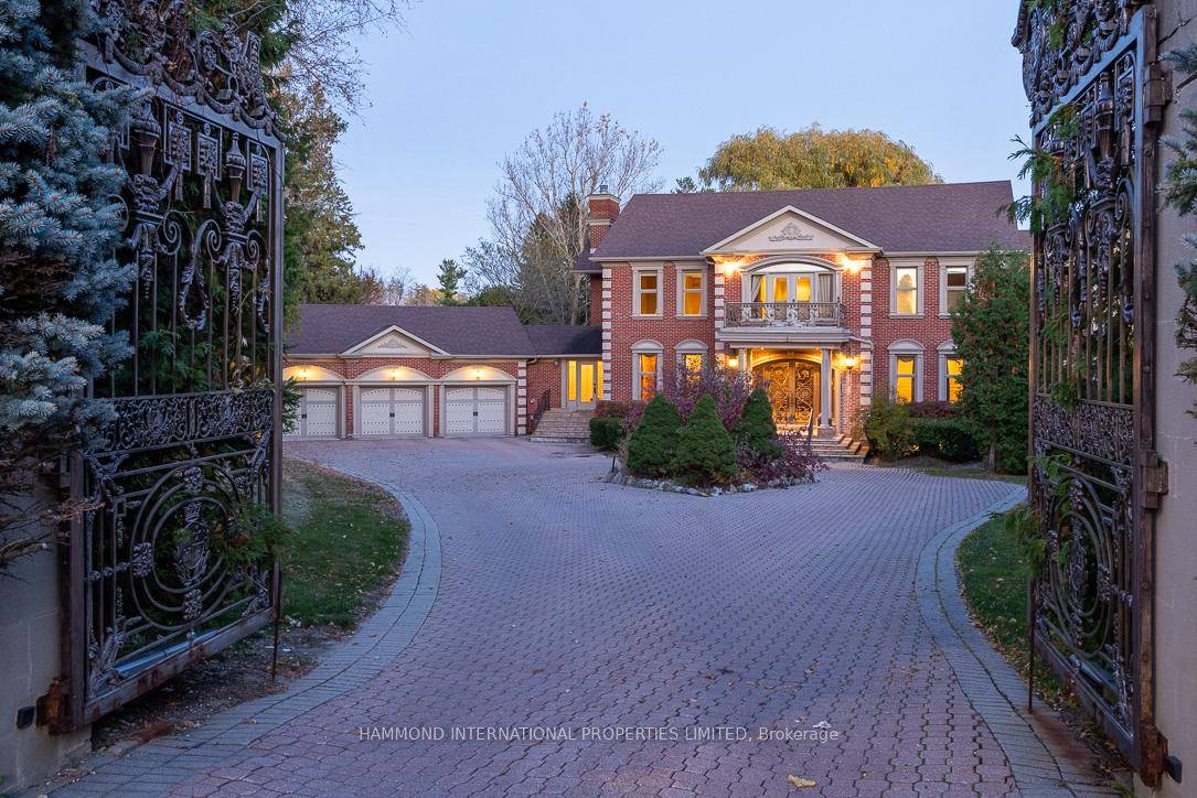 Nestled in the heart of Woodland Acres, 53 Macamo Crt sits on a very private 1.