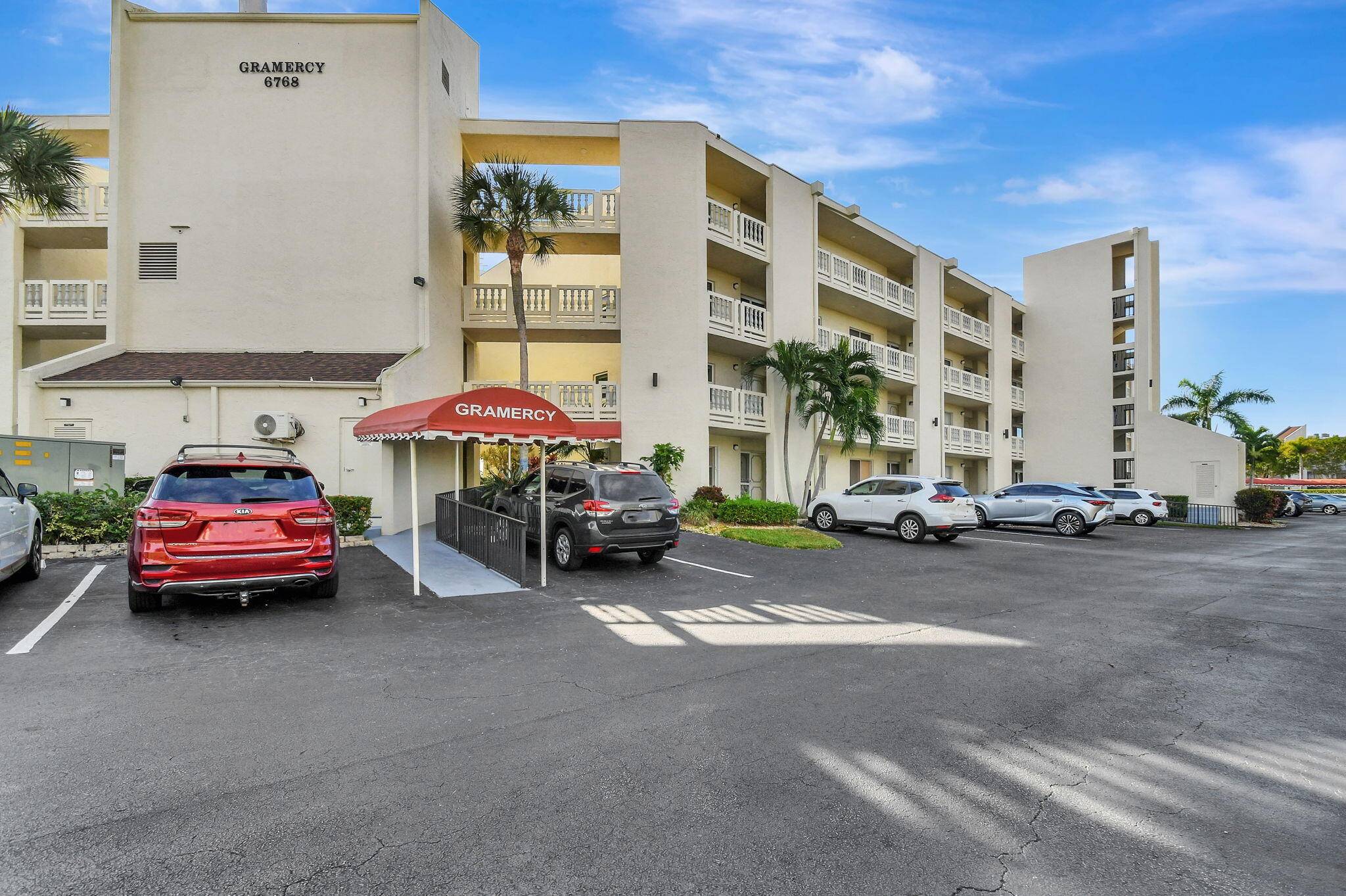 Welcome to this spacious first floor condo, perfectly situated for convenience and boasting breathtaking garden, golf, and pool views.