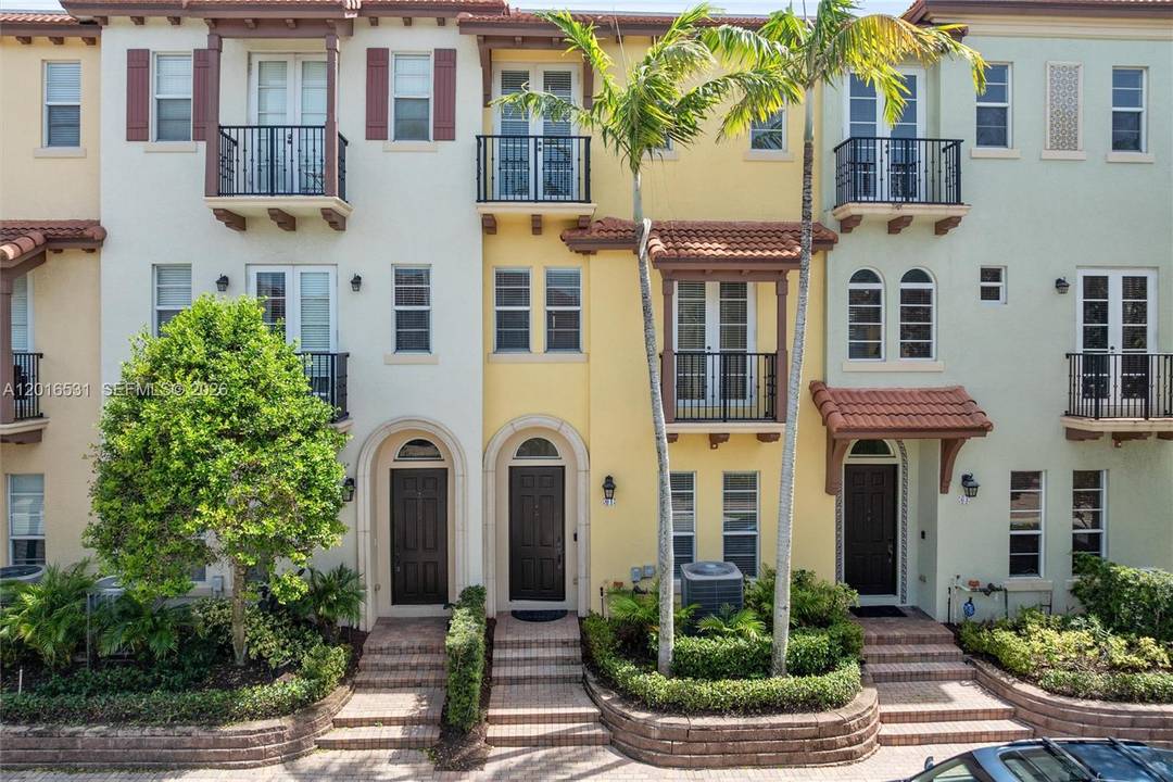 Beautifully renovated luxury townhome in a private gated Boca Raton community.