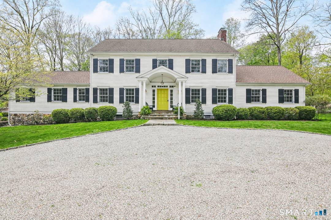 Tucked at the end of a quiet cul de sac in one of New Canaan's most sought after neighborhoods, this exceptional six bedroom Colonial offers the rare combination of privacy, ...