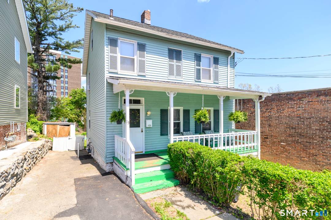 Charming 1900 Westside Colonial blending timeless character with thoughtful updates.