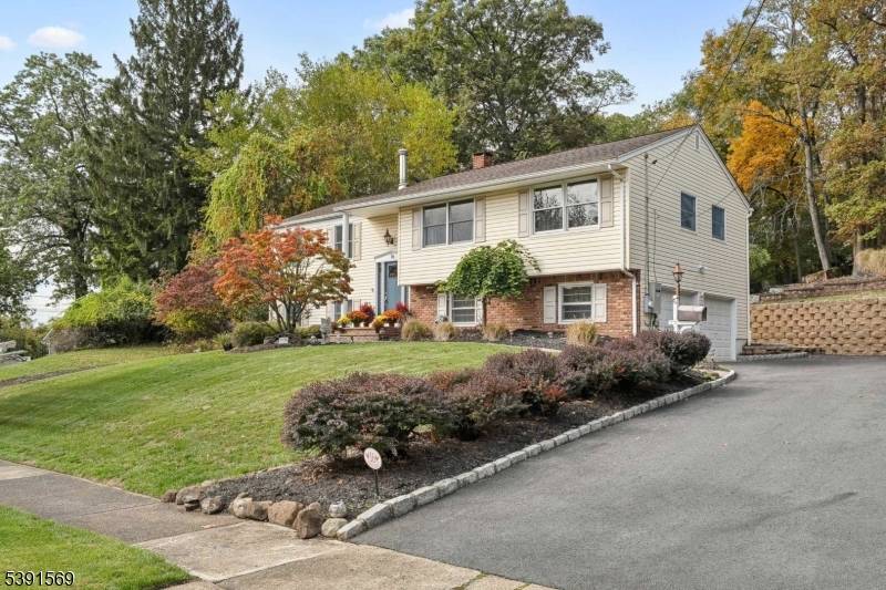 A great opportunity awaits you with this wonderful bi level home set on over a half acre of park like property.