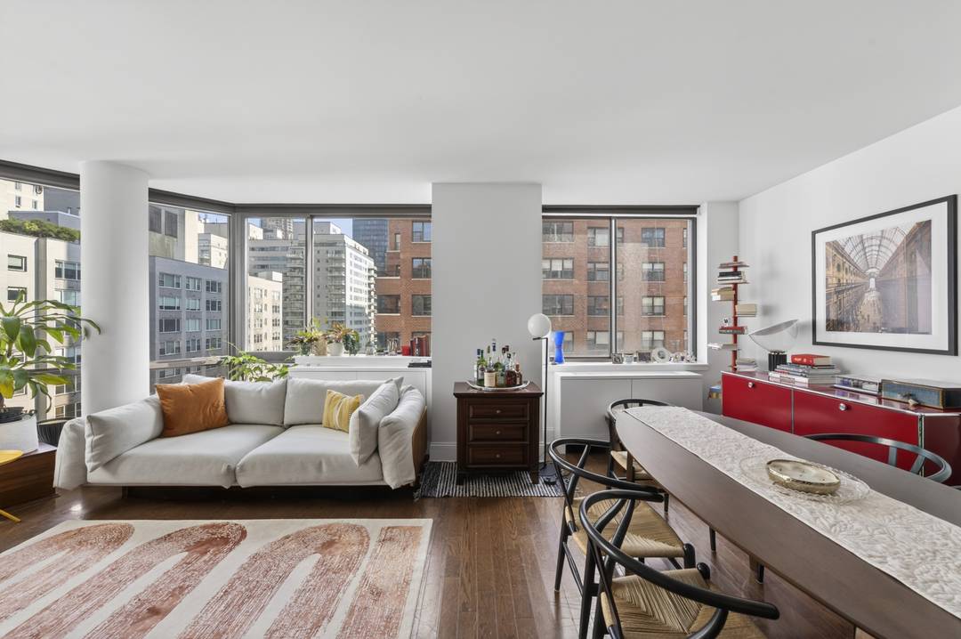 Residence 14A at SixtyFour Condominium Residence 14A is a bright and beautifully proportioned corner two bedroom, two bathroom home at SixtyFour Condominium, offering 1, 044 square feet, a true split ...