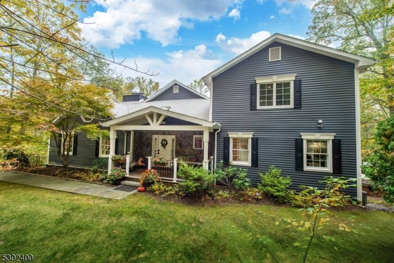 Welcome to this beautiful, expanded custom home in the prestigious Smoke Rise community.