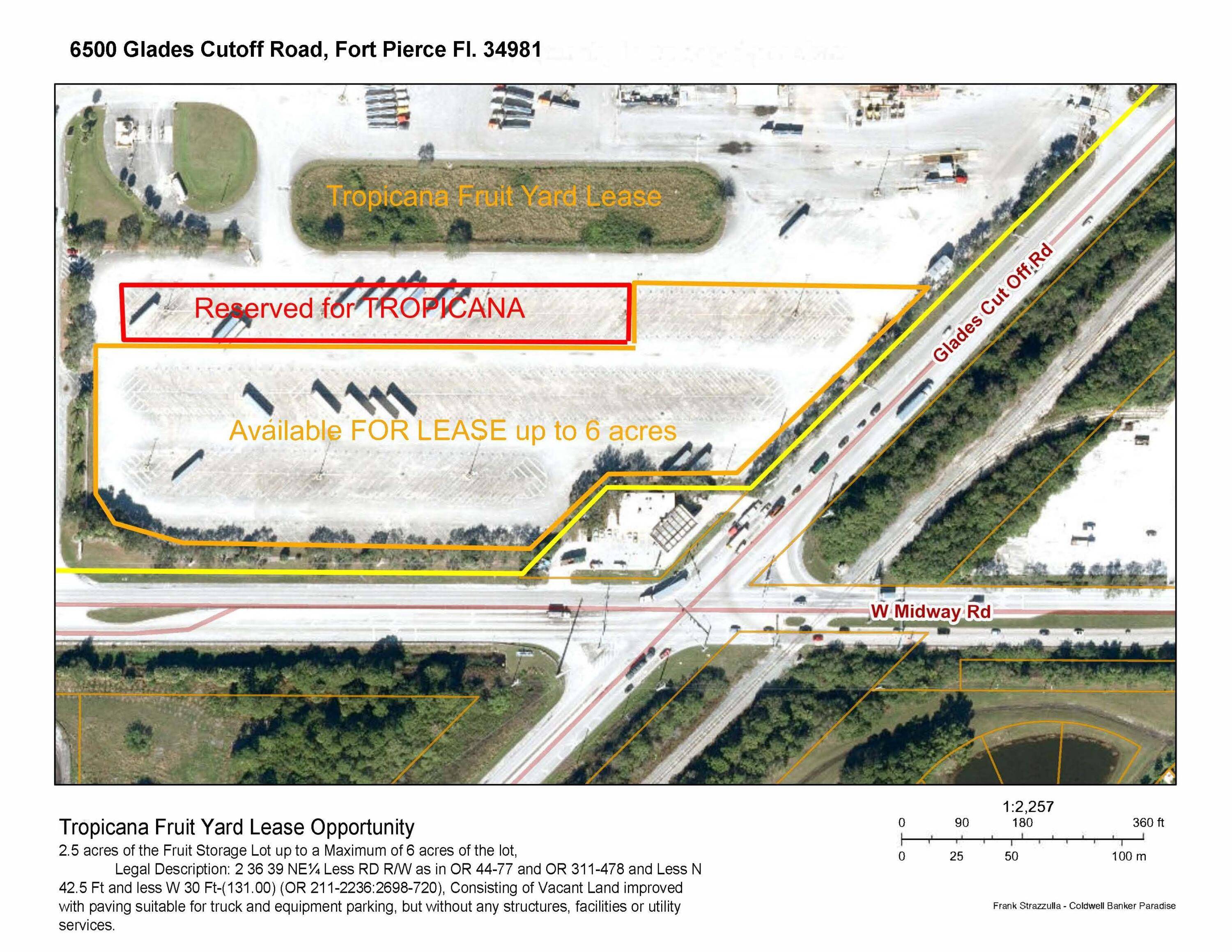 2. 5 to 6 Acres Consisting of Vacant Land improved Parking Area with paving and Fenced Lighted Security.