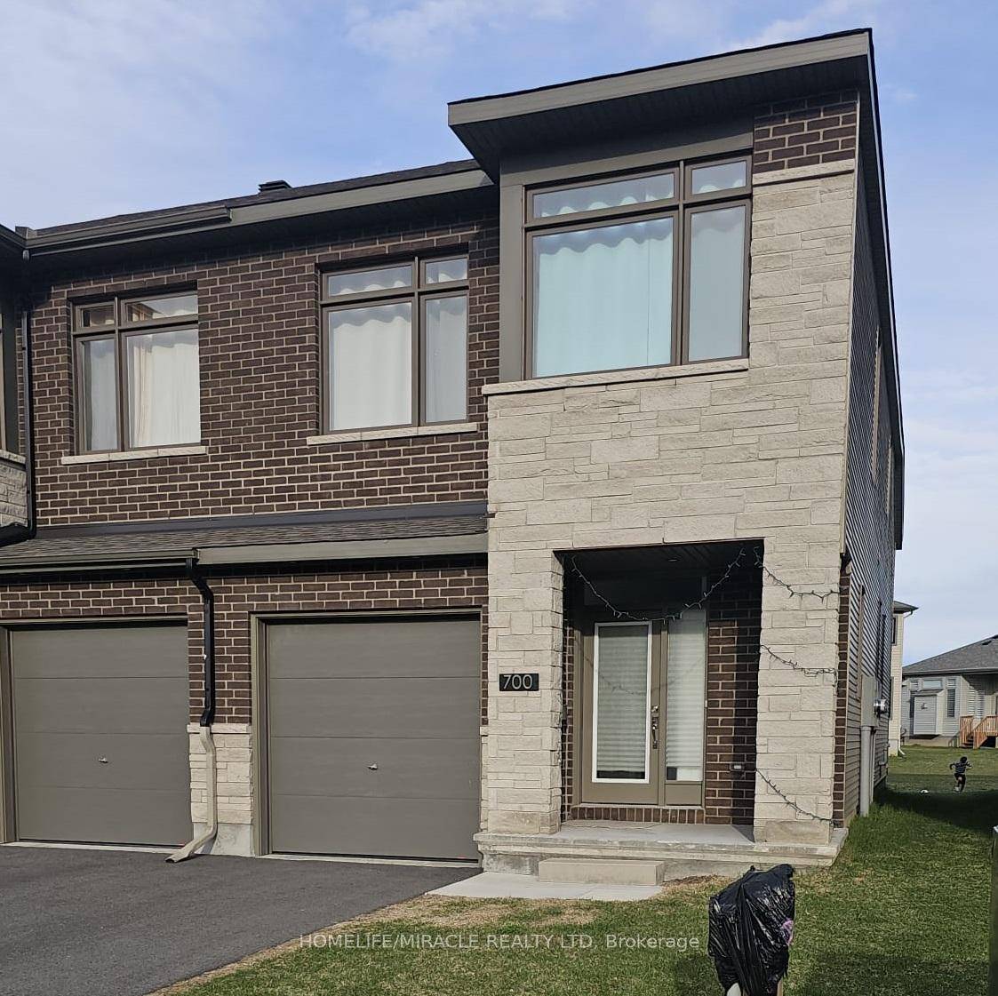 Welcome to this stunning, fully upgraded end unit townhome located in the highly desirable Findlay Creek neighborhood !
