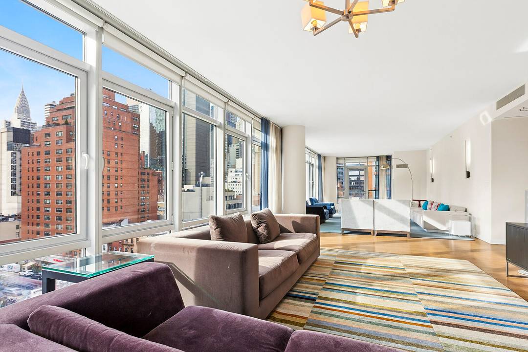 Sprawling, sophisticated, and impeccably designed, this stunning fully furnished corner three bedroom, three and a half bath residence offers sweeping skyline views, dual private terraces, and a seamless, light filled ...