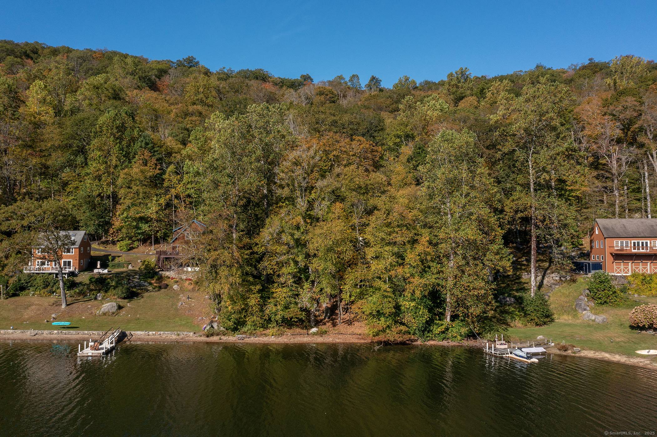 Fixer upper on waterfront lot with approximately 100 feet on Squantz Pond !
