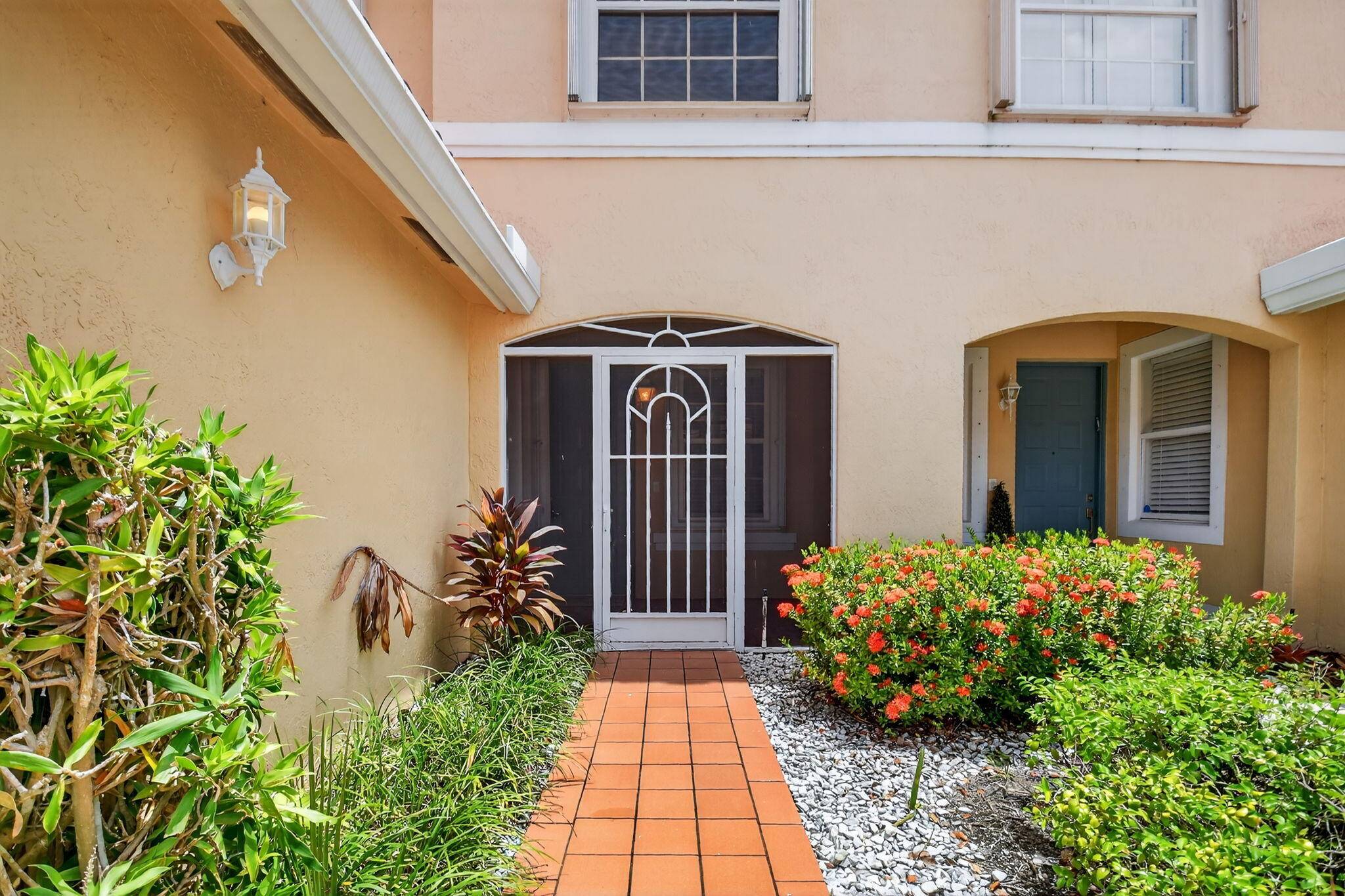 Welcome home to this oversized 1st floor condo in the vibrant Coral Lakes active 55 plus community !