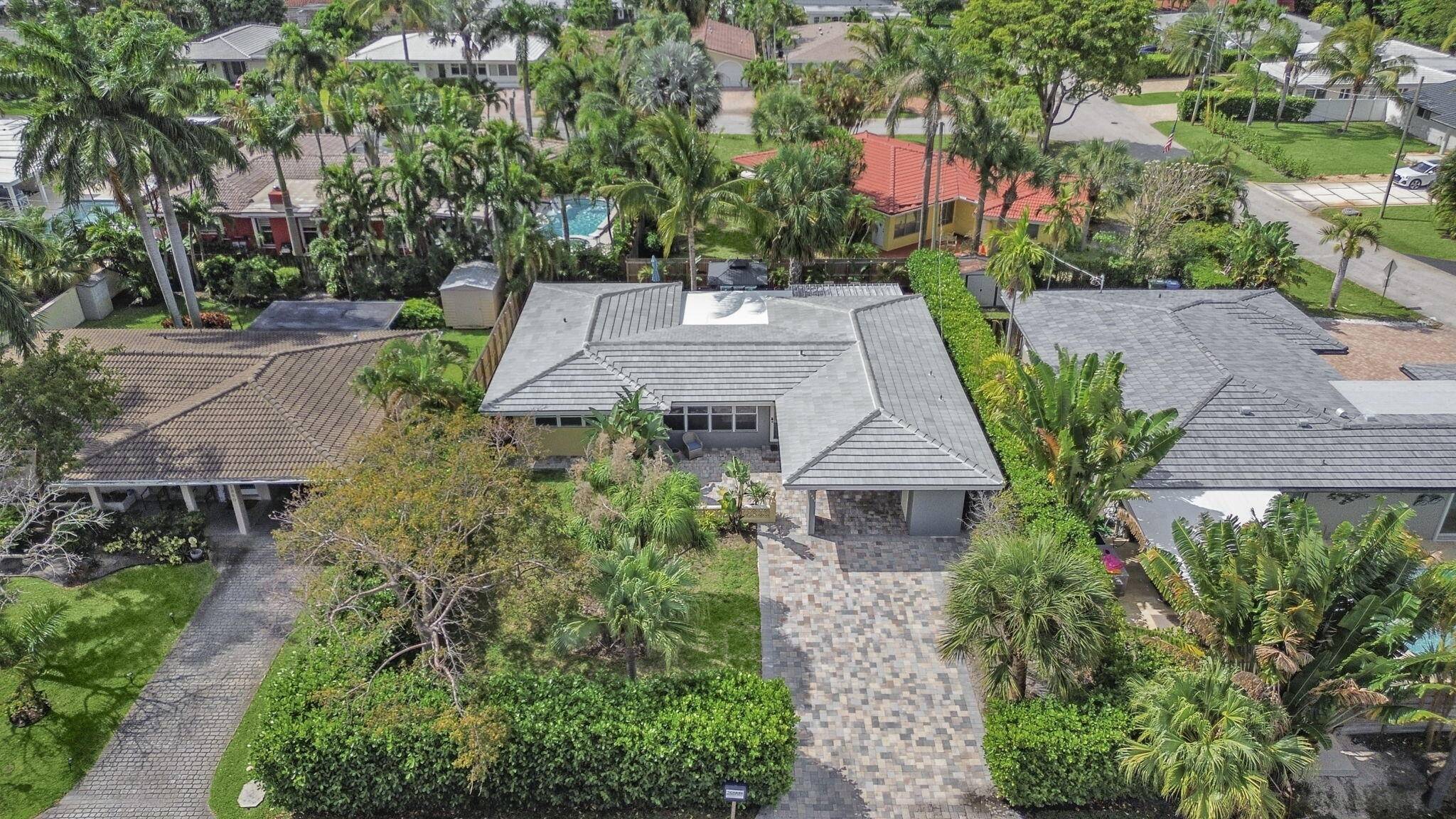 Welcome to Paradise ! This beautifully renovated home in Coral Woods has been upgraded with no expense spared.