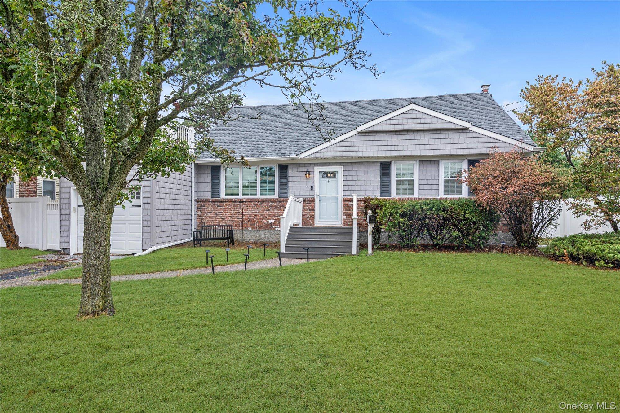 Welcome to this charming Cape style home in the heart of desirable West Islip !