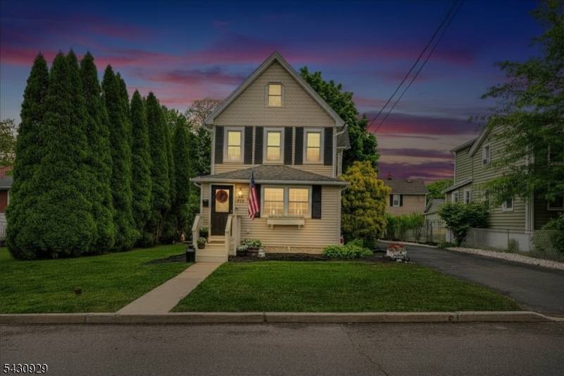 Welcome to this charming Belford colonial, where classic architecture meets thoughtful modern upgrades.