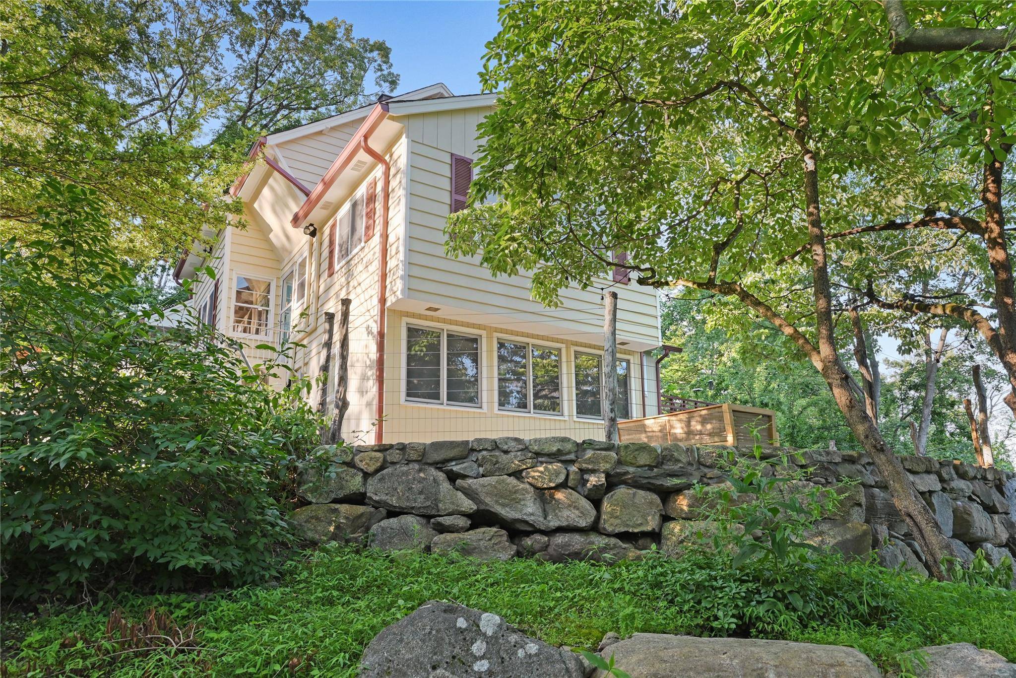 See Majestic Orchard Home Where Manhattan Meets Country Living A blend of charm and elegance, nestled among fruit bearing trees.