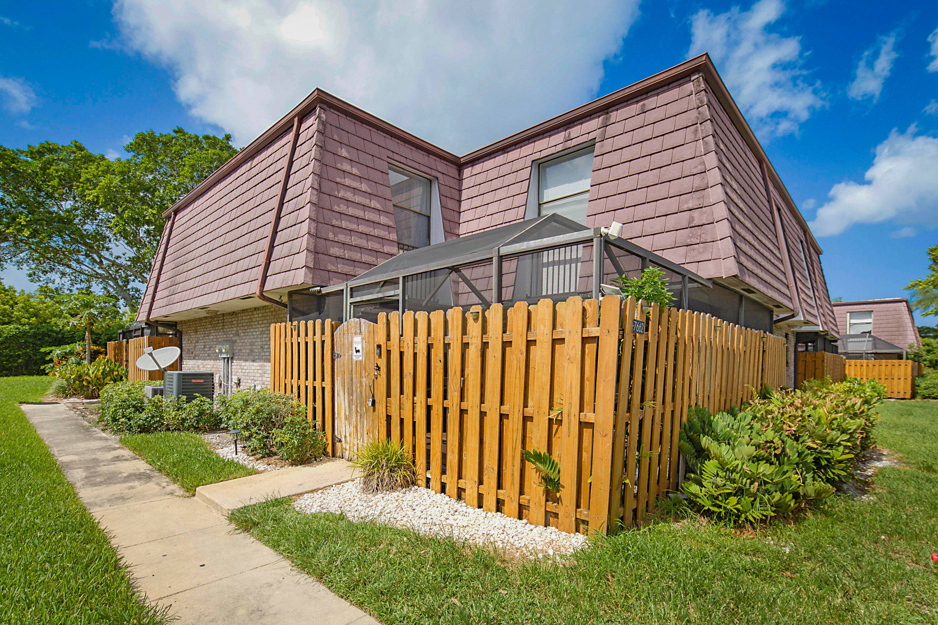 Welcome to this 3BR 2. 5BA townhome in the highly sought after Courtyards at Boca.