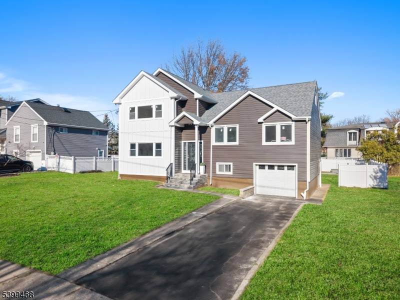 Prepare to be impressed by this fully renovated expanded split level home in the highly coveted Montclair Heights section.