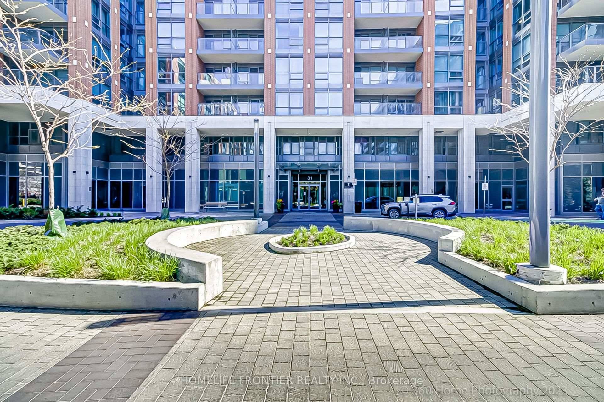 Modern Corner Unit In Luxurious Building.
